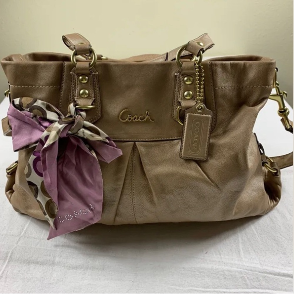 Adorable authentic Coach, in a beautiful beige that goes with everything! NWOT